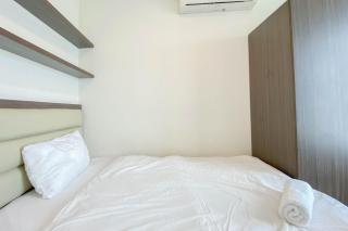 Chic and Cozy 2BR Grand Kamala Lagoon Apartment By Travelio - Bekasi - 4