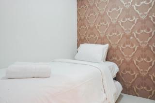 Cozy Stay at 2BR Green Pramuka City Apartment near Shopping Center By Travelio - 8