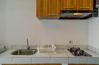 Compact and Modern Studio Room at Casa De Parco Apartment By Travelio - 3