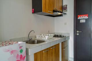 Compact and Modern Studio Room at Casa De Parco Apartment By Travelio - 2