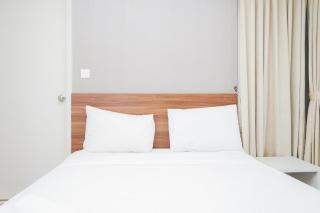 Best Mordern and Homey 2BR Apartment at Casa Grande Residence By Travelio - 0