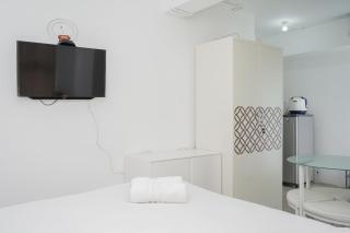 New and Simply Studio at Urbantown Serpong Apartment By Travelio - 7