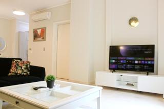 Private Garden 1BR Apt in Palm Hills AUC New Cairo - 3