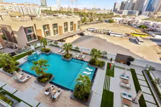 Stylish Studio with Warm Terracotta Details - Dubai - 6