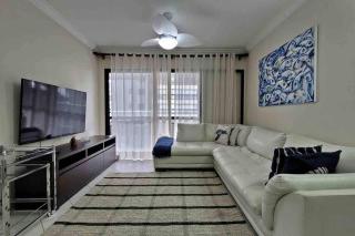 Apartamento próximo ao mar com 2 vagas de garagem, piscina aquecida e serviço de praia - Bertioga - 5