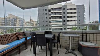 Apartamento próximo ao mar com 2 vagas de garagem, piscina aquecida e serviço de praia - Bertioga - 1