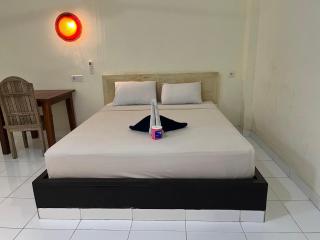 Amed Stop Inn Homestay, Rooftop Restaurant and Bar - Amed - 8