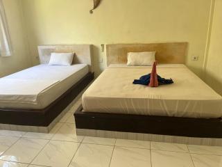 Amed Stop Inn Homestay, Rooftop Restaurant and Bar - Amed - 9