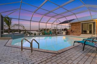 Pool, Canal Views, Sleeps 10-Villa Surfside Breeze- Roelens Vacations - Cape Coral - 1