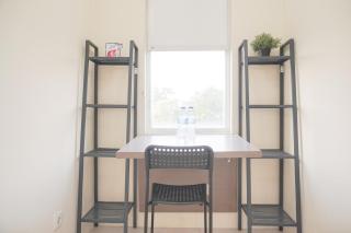 Homey and Simply Look Studio Belmont Residence Puri Apartment By Travelio - 1