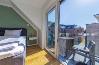 SeeGlück Malchow - Stilvolle Maisonette mit Balkonen & Seeblick - 2