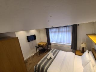 Grand near Etihad Stadium Coop Live - 2
