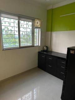 Spring Studio Apartment Opp Passport Office with AC Balcony WiFi Kitchenette - Pune - 1