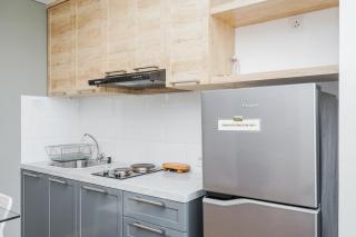 Comfy and Cool Interior 1BR at Casa De Parco Apartment BSD By Travelio - Tangerang - 4