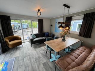 Chalet with play equipment, on a holiday park - Suameer - 8
