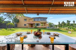 StayVista at Countryside Meadows with Pool, AC - Pune - 7