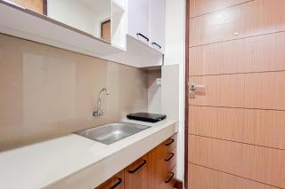 Scenic Studio Apartment at Vida View Makassar By Travelio - Pampang - 1