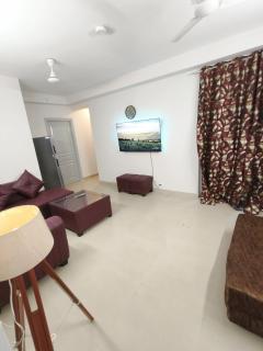 Sector143 near Advant Office-2BHK-Society-65" Smart Tv,10" Mattress-Spacious-Party,Couple,Family,WFO employes and NRI friendly Place with Kitchen ,living room ,Near Candor TechSpace,Advant IT park and Oxygen144 Center - 0