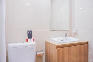 Clean and Elegant 1BR at The Oasis Apartment By Travelio - Bekasi - 6