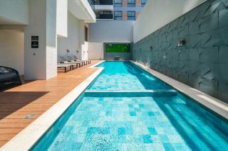 Recanto dos Girassóis 203 - Excelente apartamento 2 quartos em prédio com piscina - à 200m do mar - (Consultar serviços de roupa de cama e banho) - Bombinhas - 9