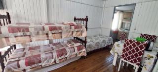 CASA de 2 quartos com 2 ares-condicionados em TORRES-RS - Na mais bela praia Gaúcha - Cozinha - Banheiro - TV smart 32 e Wi-Fi - Estacionamento - Anfitriã Superhost no BnB - Torres - 6