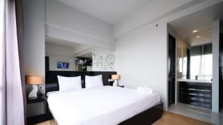 Homey Studio No Kitchen at Grand Darmo Suite Apartment By Travelio - 9