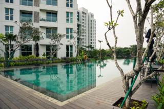 Best Deal and Comfort 1BR at Citralake Suites Apartment By Travelio - Jacarta - 5