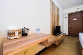 Simple and Homey Studio Room at Cinere Resort Apartment By Travelio - Depok - 7