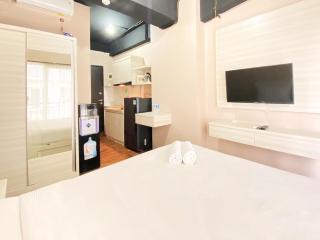 Comfort Minimalist Studio at 3rd Floor Grand Asia Afrika Apartment By Travelio - 5