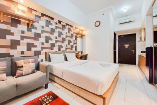 Warm and Homey Studio Room Casa de Parco Apartment By Travelio - Tangerang - 1