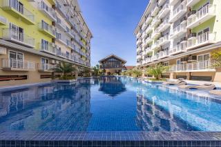 617A Condotel Near Airport &Mall with Pool,Gym,Netflix - - 1