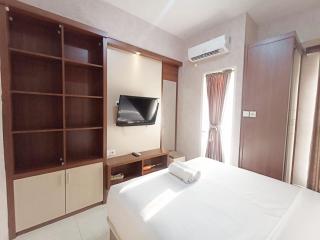 Modern Look and Homey Studio Amartha View Apartment By Travelio - Semarang - 1