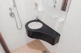 Nice and Comfortable Studio Apartment at Sky House BSD By Travelio - 1