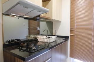 Strategic and Comfortable 1BR Apartment at Parahyangan Residence By Travelio - 1