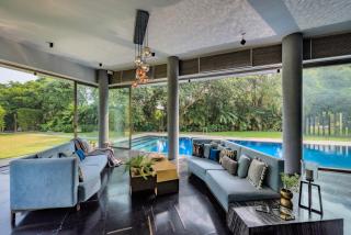 SaffronStays Glasshouse 91 - 4BR luxury villa with pool, art installations, lawns & outdoor dining - 3