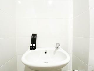 Comfort and Cozy Stay 1BR at The Alton Apartment By Travelio - Semarang - 1