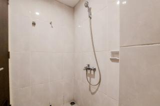 Cozy Stay Studio at Serpong Garden Apartment By Travelio - 1