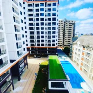 luxurious fully furnished two bedroom apartment with amazing city views heated swimming pool fully equipped gym with a child play area and ample parking space - Nairobi - 7