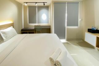 Homey and Well Furnished Studio Gateway Park LRT City Jatibening Apartment By Travelio - 8