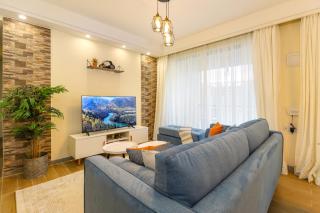supreme living two bedroom apartment with breathtaking amazing city views gym heated swimming pool fully equipped gym children playground and ample parking space and proximity to major shopping malls and gourmet restraunts - Nairobi - 2