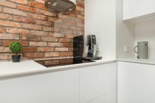 Elegancki Apartament z Klimatyzowanym Salonem, Wanną i Parkingiem w Centrum Łodzi by Renters Prestige - 7