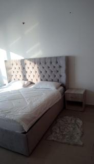 Elegant Sea View Bedroom with Shared Balcony and WC, Spacious and Serene Retreat - ROOM INSIDE APARTMENT - Ajman - 2