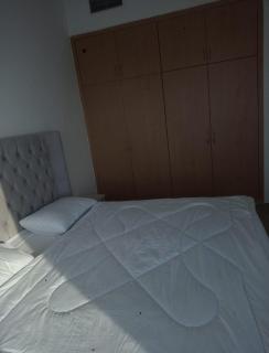 Elegant Sea View Bedroom with Shared Balcony and WC, Spacious and Serene Retreat - ROOM INSIDE APARTMENT - Ajman - 3