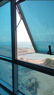 Elegant Sea View Bedroom with Shared Balcony and WC, Spacious and Serene Retreat - ROOM INSIDE APARTMENT - Ajman - 0