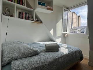 Studio cosy sur la festive rue du Fbg Saint-Denis - París - 5