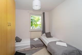 Rodzinny Apartament 3city z 5 Sypialniami, Parkingiem i Ogródkiem by Noclegi Renters - 6