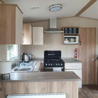 Caravan under the tree, Seton Sands - 8