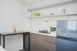 Warm and Simply Studio Room at Urbantown Serpong Apartment By Travelio - 7