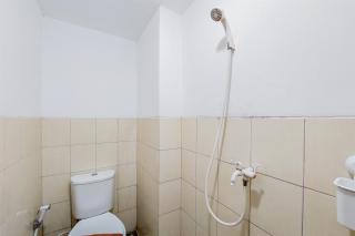 Warm and Simply Studio Room at Urbantown Serpong Apartment By Travelio - 6