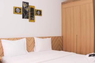 Homey and Cozy Stay Studio Apartment at Patraland Urbano By Travelio - Bekasi - 4